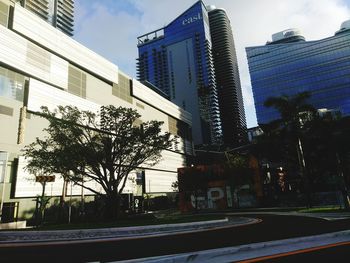 Low angle view of skyscrapers against sky