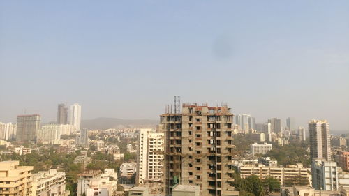 Cityscape against clear sky