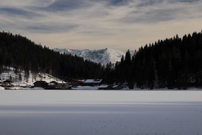 Scenic view of snowcapped mountains against sky