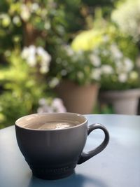 Close-up of coffee cup on table