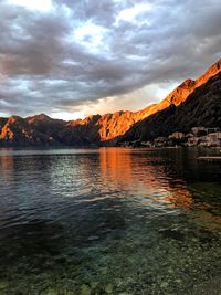 Scenic view of lake against sky during sunset