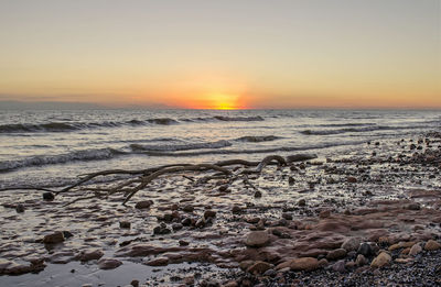 Scenic view of sea against sky during sunset