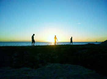 Scenic view of sea at sunset