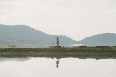 Scenic view of lake against clear sky