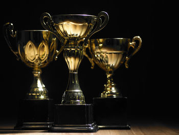 Close-up of wine glasses on table