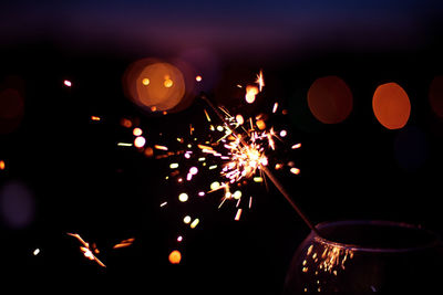 Close-up of firework display at night