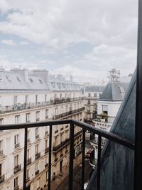 Buildings in city against sky