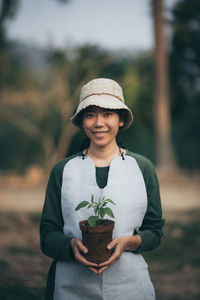 Portrait of smiling young man wearing hat