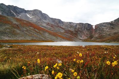 Scenic view of mountains and lake against sky