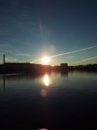 Scenic view of sunset over river