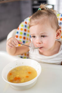 Close-up of boy eating food