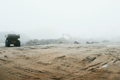 Scenic view of beach against clear sky