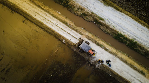 High angle view of abandoned car on land