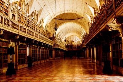 Illuminated corridor of building