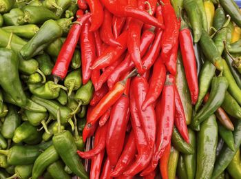 Full frame shot of red chili peppers for sale at market