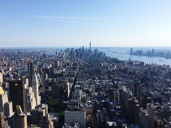 High angle view of city buildings against sky