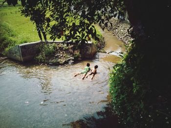 High angle view of people in water