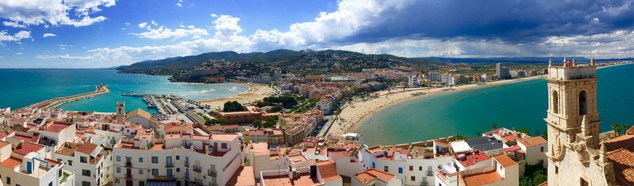 High angle view of town by sea