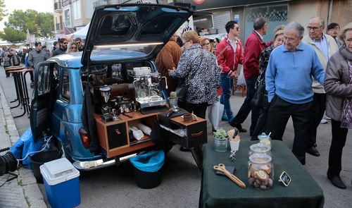 People standing in car