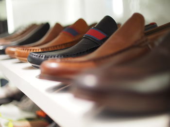 Close-up of shoes on table