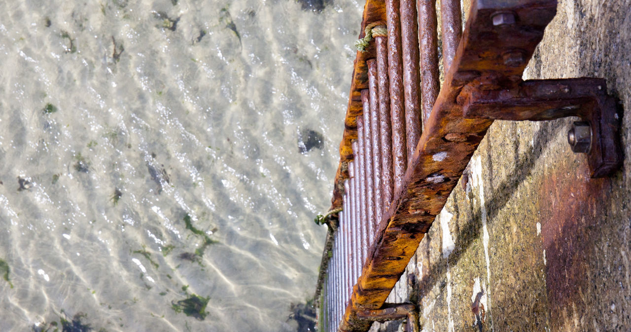 HIGH ANGLE VIEW OF OLD RUSTY METAL