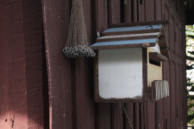 Close-up of mail slot against wall