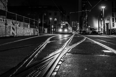 View of railroad tracks at night