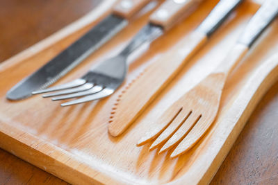 Close-up of eating utensils in tray