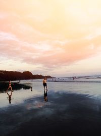 Scenic view of sea at sunset