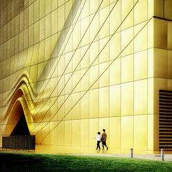 People walking on modern building