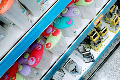 High angle view of books in shelf