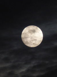 Low angle view of moon against sky at night