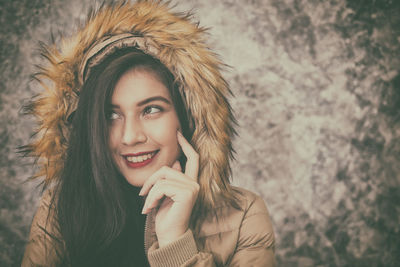 Close-up portrait of happy young woman