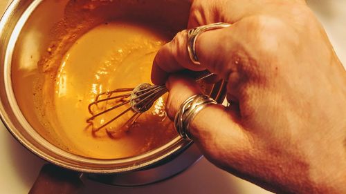 Close-up of man preparing food