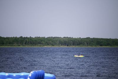 Boats in calm lake