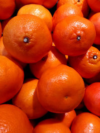 Full frame shot of oranges at market stall