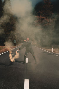 Man on road in city