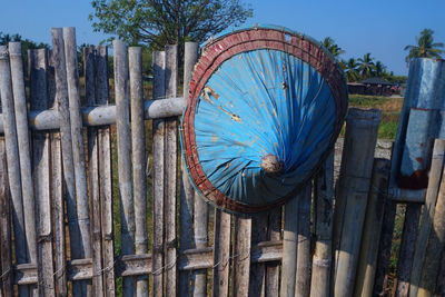 Low angle view of wooden fence