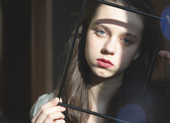 Close-up portrait of a beautiful young woman