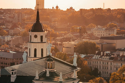 High angle view of vilnius cityscape with cathedral and bell tower at sunset, in october