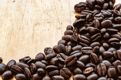 Close-up of coffee beans on table