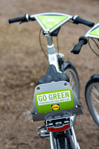 Close-up of bicycle parked on road