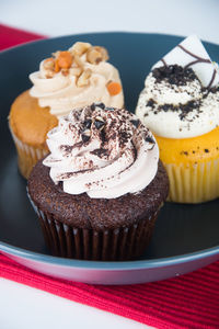 Close-up of cupcakes in plate