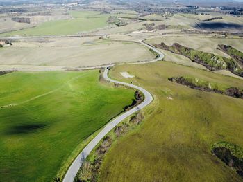 High angle view of road amidst field