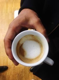 Close-up of coffee cup on table