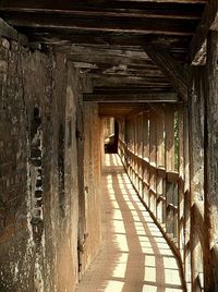 Narrow walkway along walls