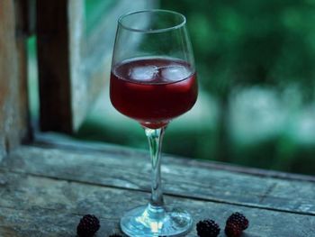 Close-up of wineglass on table