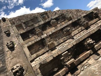 Low angle view of old ruins against sky