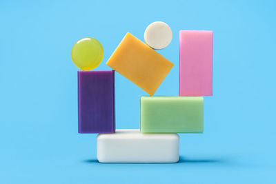 Close-up of toys against blue background