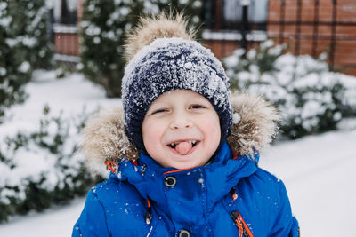 Portrait of cute girl in snow